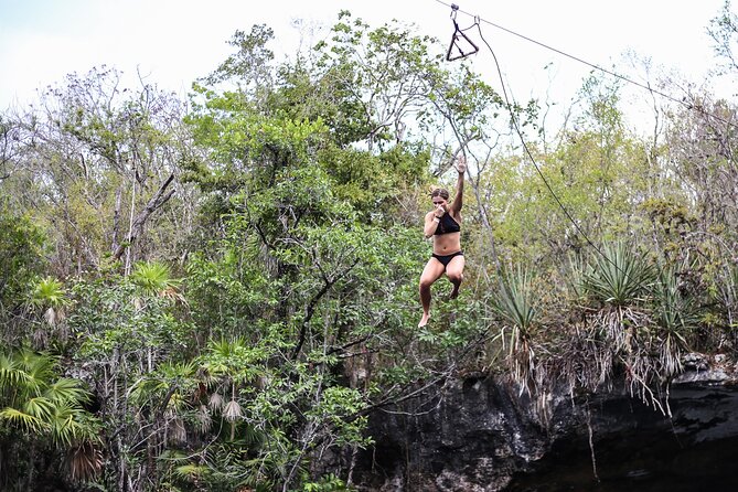 4 Private Cenotes, Zip-Lines, Canoes & Mayan Village with Delicious Lunch - Cenotes: swim spots, warm water, and the mosquito reality