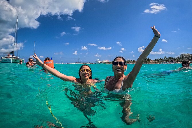 All-Inclusive Isla Mujeres Catamaran with Free Transportation - Blanquizal sandbar swim stop: the quick turquoise payoff