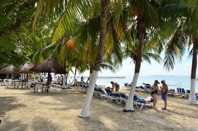 All-Inclusive Isla Mujeres Catamaran with Free Transportation - Returning to Cancun with sunset on the deck
