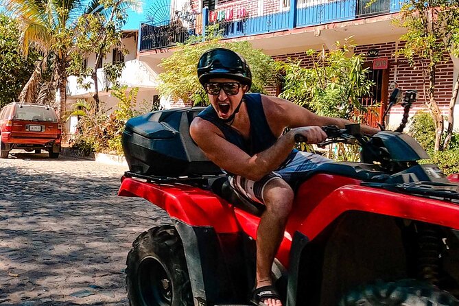 ATV-Zip Line Combo Adventure Tour from Puerto Vallarta - The Malecon Boardwalk and Zona Romantica ride, before the dirt starts flying