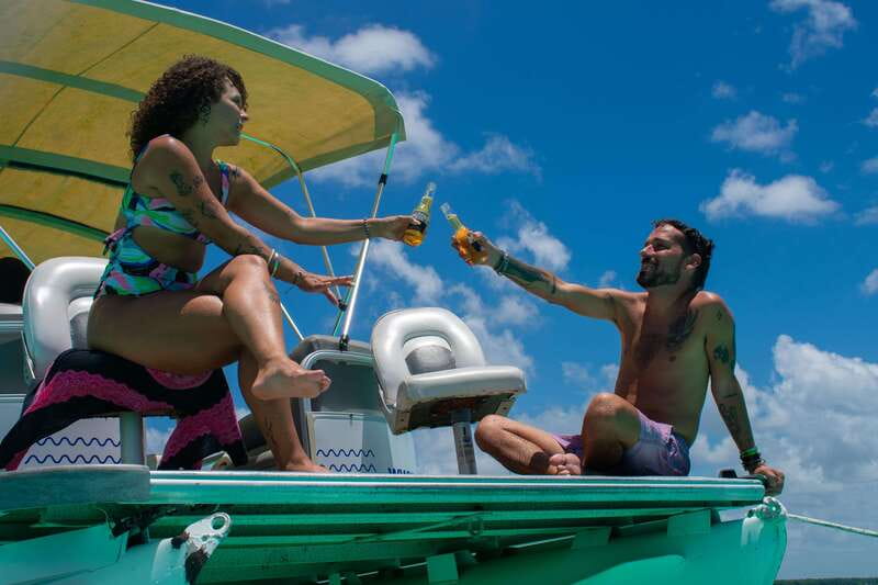 Bacalar: 3-hr Pontoon Boat Tour with Beach Club + Kayaks - Pirate Canal swim break and the included beer picnic