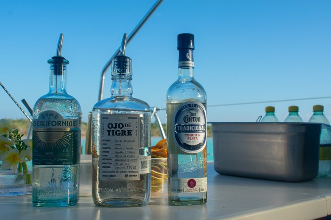 Bacalar - Gourmet Tour in Private Catamaran with Cocktails Included - The gourmet meal plan: guacamole, raw fish, sushi, and grilled skewers
