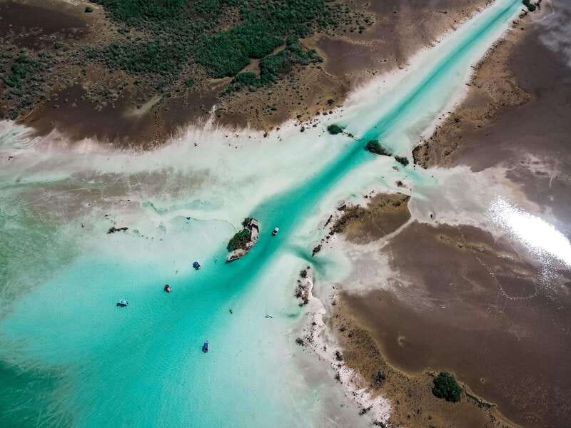 Bacalar: Lake of Seven Colors Pontoon Tour with Fruit - Arriving at Marina Laguna Adventures in the Agua Dulce beach club