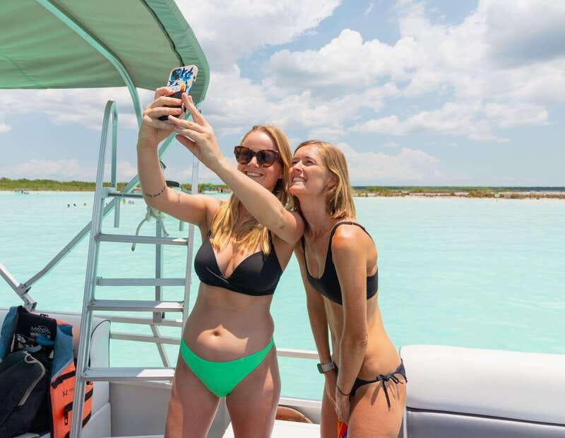 Bacalar: Lake of Seven Colors Pontoon Tour with Fruit - Swim time in the shallow lagoon, plus fruit and ice