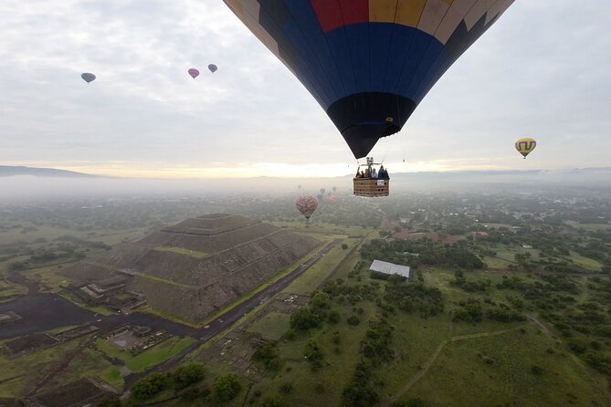 Balloon flight with breakfast in Cave and Pyramids tour from CDMX - Teotihuacan ruins: pacing, the guide option, and the Quetzalcoatl temple