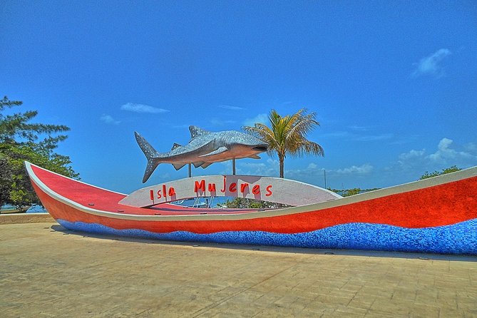 Beach Escape: Isla Contoy and Isla Mujeres with Snorkeling. - Isla Mujeres in one hour: shops and beach time, not a full day