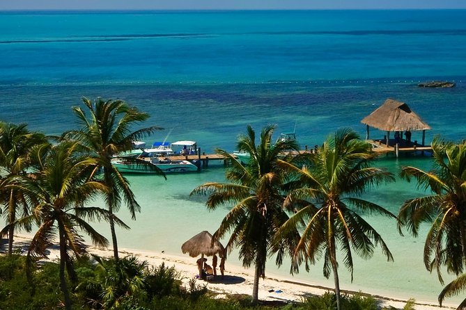 Beach Escape: Isla Contoy and Isla Mujeres with Snorkeling. - First stop vibes: Flamingos and an easy breakfast rhythm