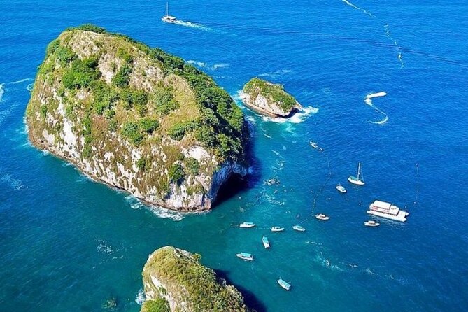 Boat and Snorkel Tour to 5 Islands of Los Arcos - Beach time at Mismaloya, plus the real-world food situation