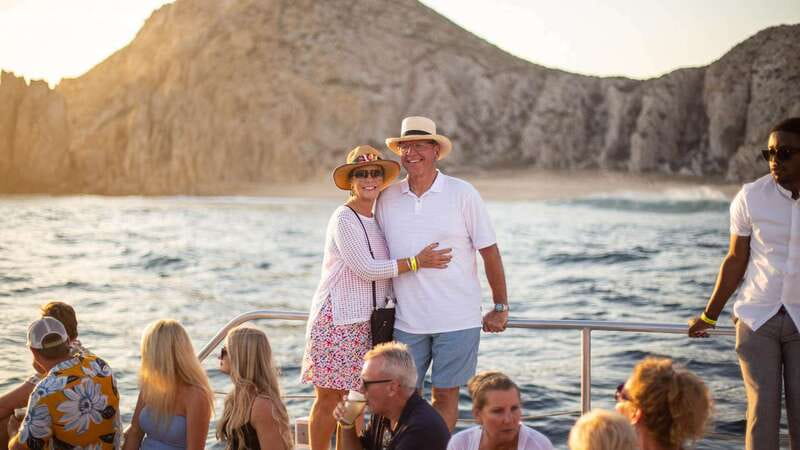 Cabo San Lucas: 2 Hour Sunset Cruise with Food and Wine - Getting on board: pickup spots, what the driver looks like, and clothing rules