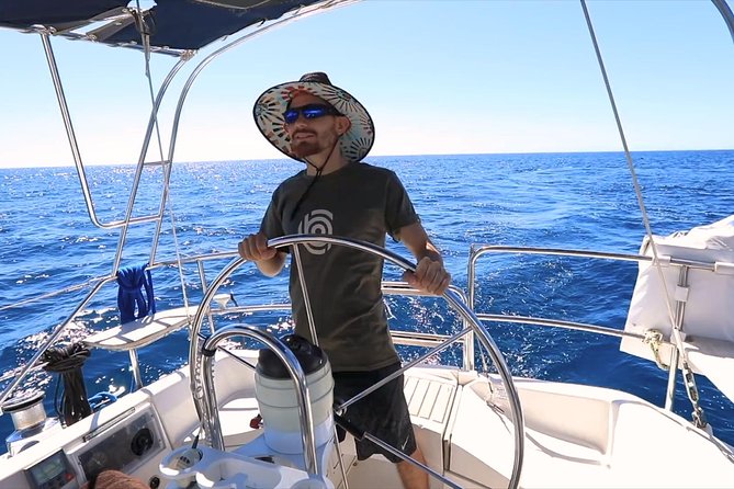 Cabo San Lucas Private 38 ft Sailing Tour with Snorkeling - Stop 2: Pelican Rock snorkeling in clear water
