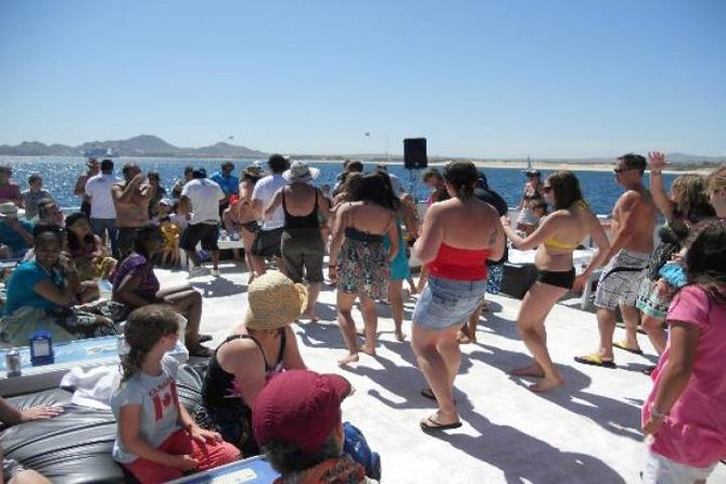 Cabo San Lucas Sunset Dinner Cruise with Open Bar - Party boat energy: DJ volume, dancing, and shared space