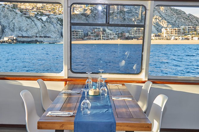 Cabo Sunset Dinner Cruise with Live Music & Open Bar on Cabo Wave - First photo stop at El Arco: watching the Arch at golden hour