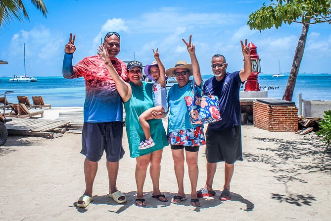 Cancun All Inclusive Catamaran Tour to Isla Mujeres - Catamaran cruise to Isla Mujeres: open bar, music, and a lively crew vibe