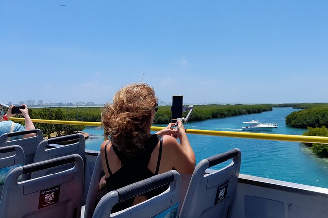 Cancun City Sightseeing and Shopping Tour on a Double Decker bus - Double-Decker Day, With a Practical Twist on the Ride