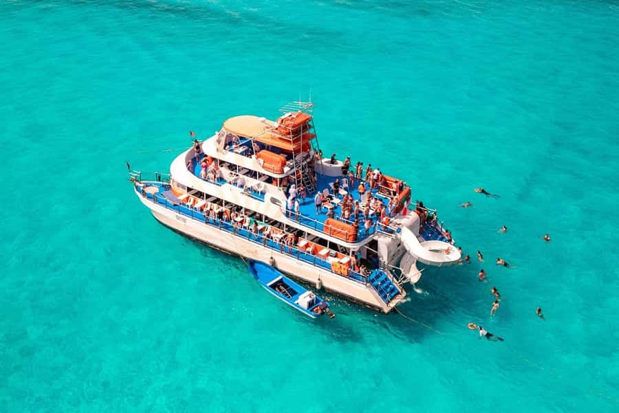 Cancun: Isla Mujeres Full Day Dancer Cruise - Meco reef snorkeling: colorful fish and no long logistics