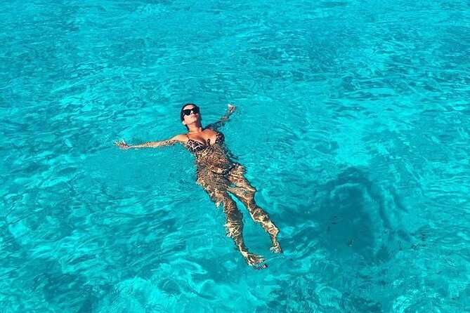 Cancun Sailing Catamaran Islas Mujeres With Luxury Beach Club - Snorkeling at El Meco Reef: included gear, short session, real rules