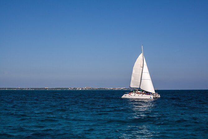 Cancun Sailing Catamaran Islas Mujeres With Luxury Beach Club - Boat day logistics: where you meet and how to think about timing