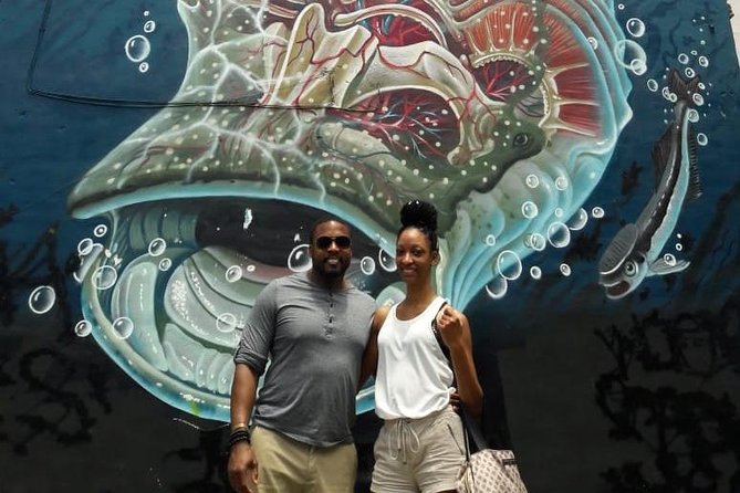 Cancun Street Food Tour with Food Stalls, Local Market and Murals - Mercado 23: eating and strolling through a real local market