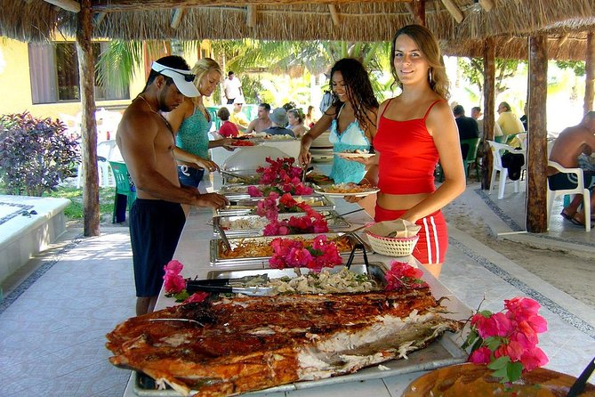 Catamaran Sailing to Isla Mujeres with Snorkeling, Lunch & Open Bar included - Spinnaker Flying and Open Bar Sailing Time