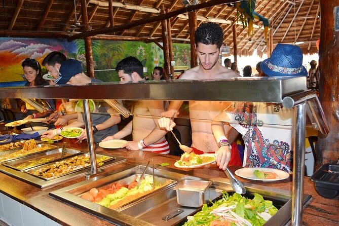 Catamaran Tour to Isla Mujeres from Cancún with Bar and Lunch - Isla Mujeres town time: souvenirs and a little wandering