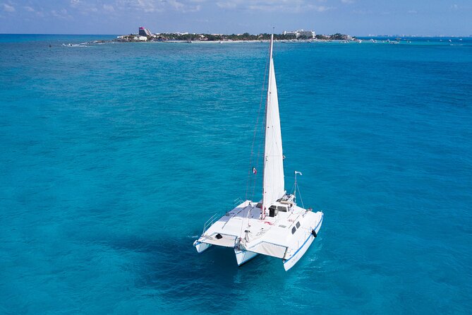 Catamaran with Snorkeling and North Beach, Isla Mujeres - The Return to Playa Tortugas: Free Drinks and a Family-Friendly Finish