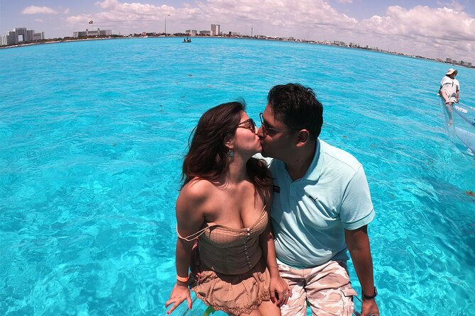Clearboat: Glass-bottom boat ride to the Caribean Sea - From Isla Mujeres: crystal water, calm viewing, and reef time near the island