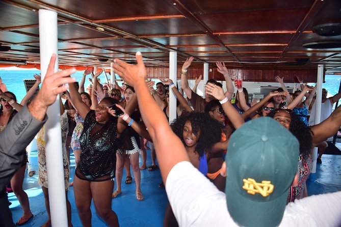Dancer Cruise Isla Mujeres Snorkel Food and Drinks Included - The first hour on board: breakfast, armbands, and the show begins