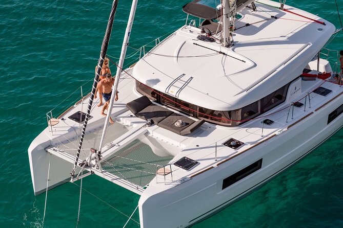 Deluxe Private Boats - 40 ft Catamaran - Stop 3 at Playa El Cielo: electric-blue water and stingray chances