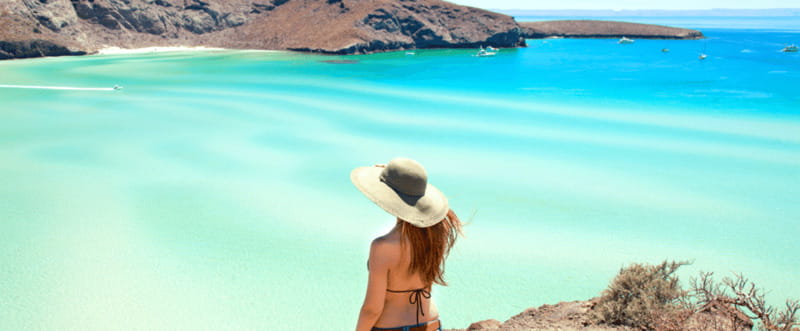 From Los Cabos: City Tour La Paz, Balandra and Todos Santos - Playa El Coromuel: shade breaks and an easy family-friendly stop