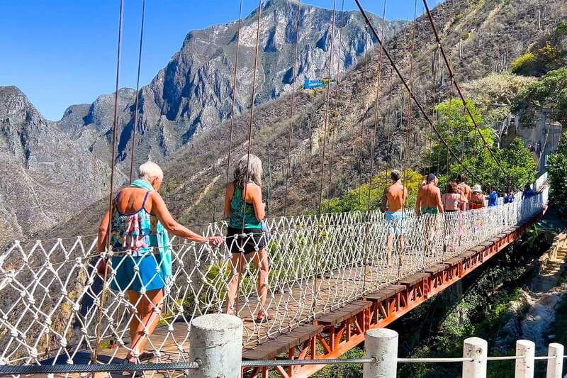 From Mexico City: Tolantongo Hot Springs Day Trip with Guide - Caves, Tunnels, River, and the Suspension Bridge Walk