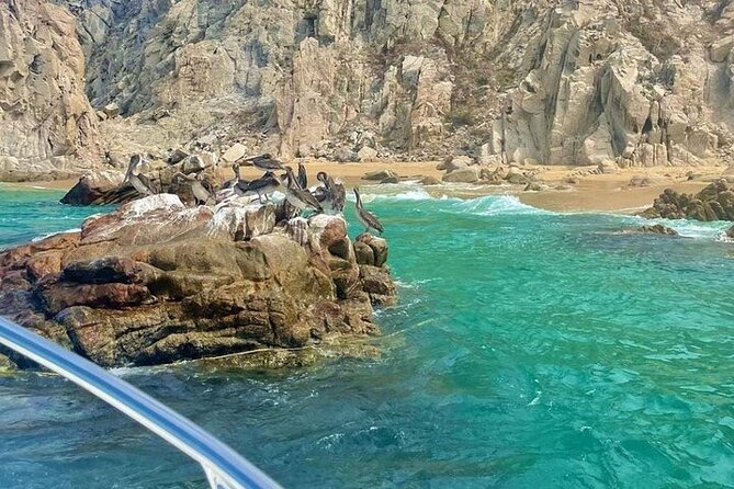 Glass Bottom Boat to the Arch and Lovers Beach: Optional Pickup - Pelican Rock, Neptune’s Finger, and the Arch From Below