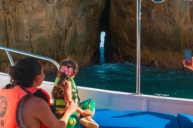Glass-bottom boat tour to the Arch + beach time - The rock formations, including the one that splits the oceans