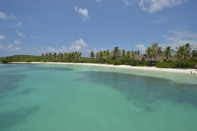 Isla Contoy Eco Adventure - The open bar experience: fun energy, loud speakers, and safety vibes