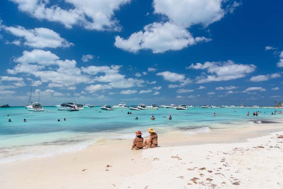 Isla Mujeres: Catamaran Ride with Open Bar, Snorkeling, and Lunch - Leaving Cancun onboard: open bar, music, and the coast vibe