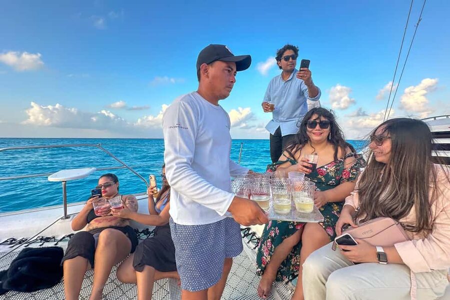 Isla Mujeres: Catamaran Ride with Open Bar, Snorkeling, and Lunch - Practical tips for your bag, your body, and your beach time