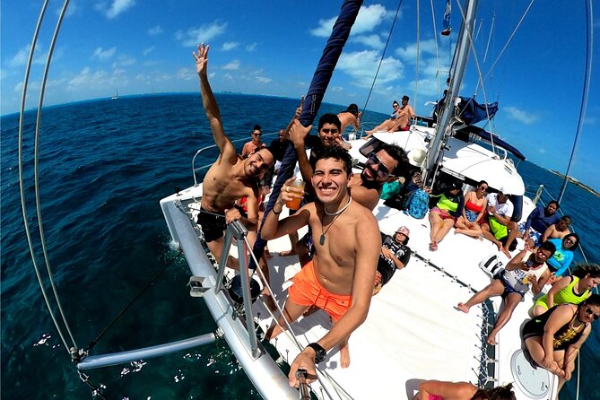 Isla Mujeres Catamaran + Snorkel + Open Bar on board + Buffet - Cruising Out: Open Bar Fun, Onboard Snorkel Gear, and Spinnaker Plans