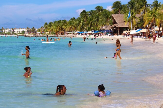 Isla Mujeres Catamaran Tour with Snorkeling at MUSA, Buffet Lunch & Open Bar - Getting On Board at Cancun Bay Resort, and What the First Hour Feels Like