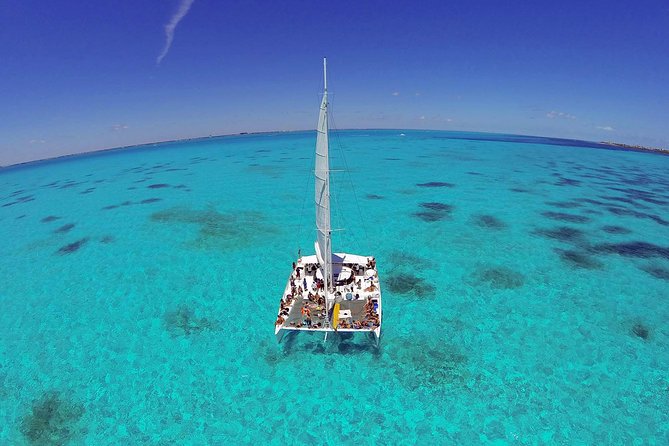 Isla Mujeres Catamaran Tour with Snorkeling at MUSA, Buffet Lunch & Open Bar - MUSA Snorkeling: 500 Statues, Coral-Friendly Materials, and Real Ocean Curiosity