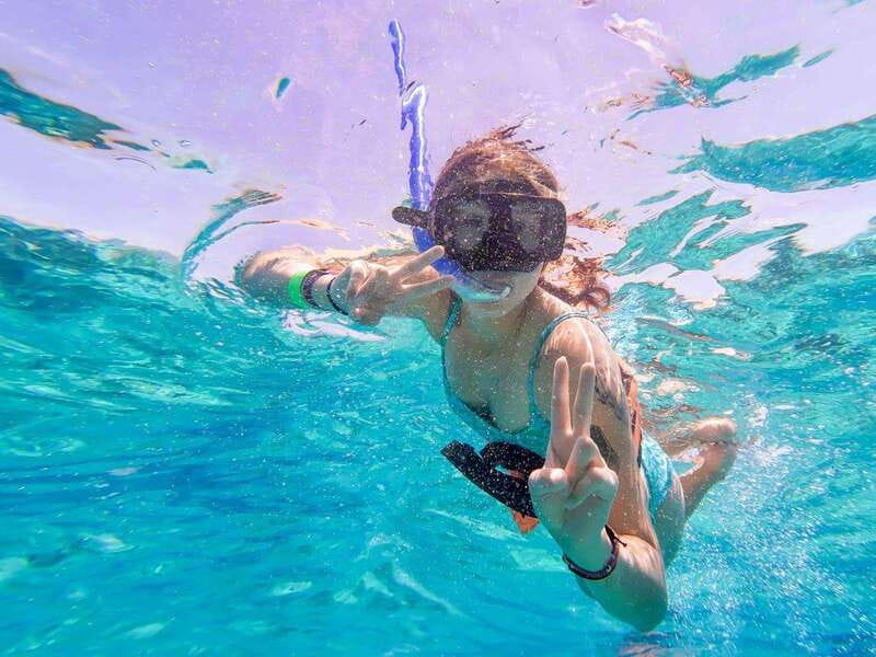 Isla Mujeres: Catamaran with Open Bar, Snorkeling and Lunch - Playa Norte and the Beach Club: Where the Day Slows Down