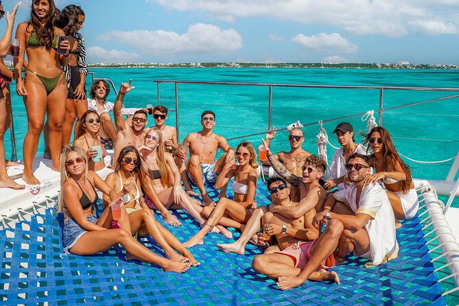 Isla Mujeres Cruise with Beach Club, Snorkel, Lunch and Open Bar - From your hotel area to Marina Las Perlas, this starts fast