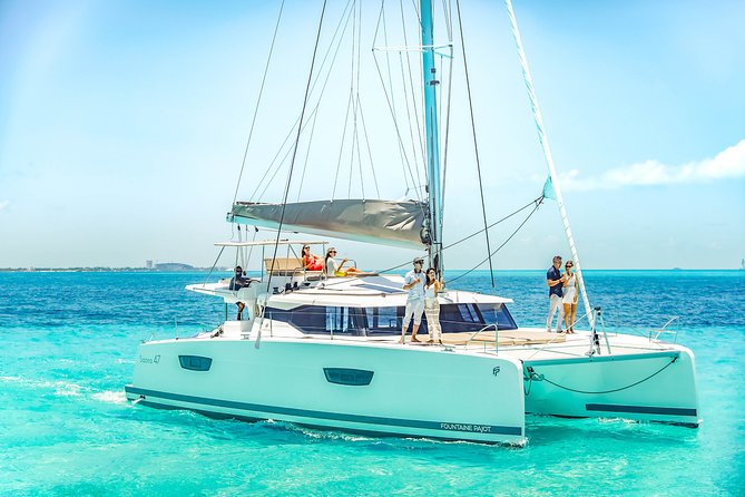 Isla Mujeres luxury catamaran with premium open bar and lunch - Reef tax, towels, and the extras people forget