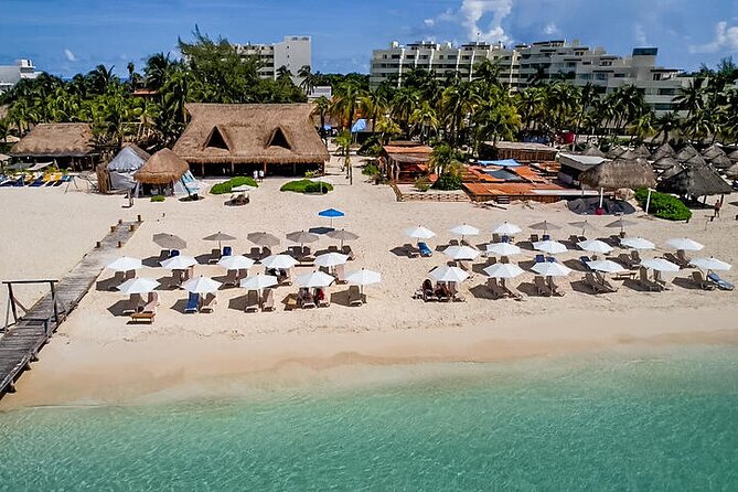 Isla Mujeres luxury catamaran with premium open bar and lunch - At-sea experience: open bar, snacks, and what snorkeling feels like