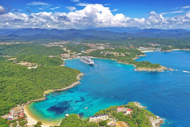 Kayak Huatulco Sunrise - Beach breakfast, snorkel time, and a quick walk to a lookout