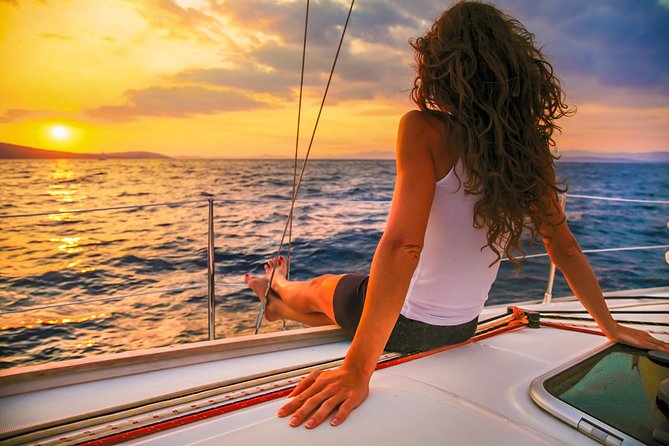 Los Cabos Luxury Sunset Sail with Light Appetizers and Open Bar - Crew service, music, and the photo add-on
