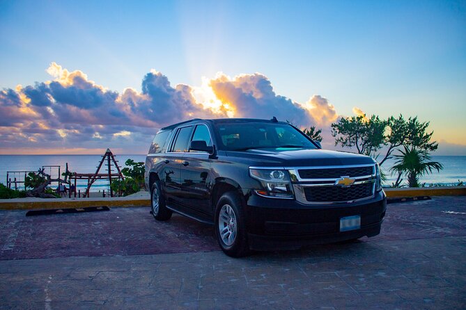 Luxury SUV arrivals from Cancun Airport one way - Name-on-a-tablet pickup, WhatsApp directions, and the first 10 minutes