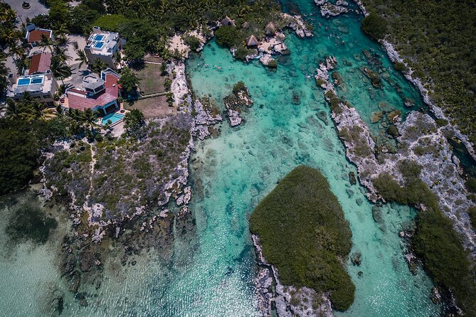 Magical Cenote and Paradise Lagoon Snorkeling Adventure - The cenote experience: cold water, cave darkness, and no phones