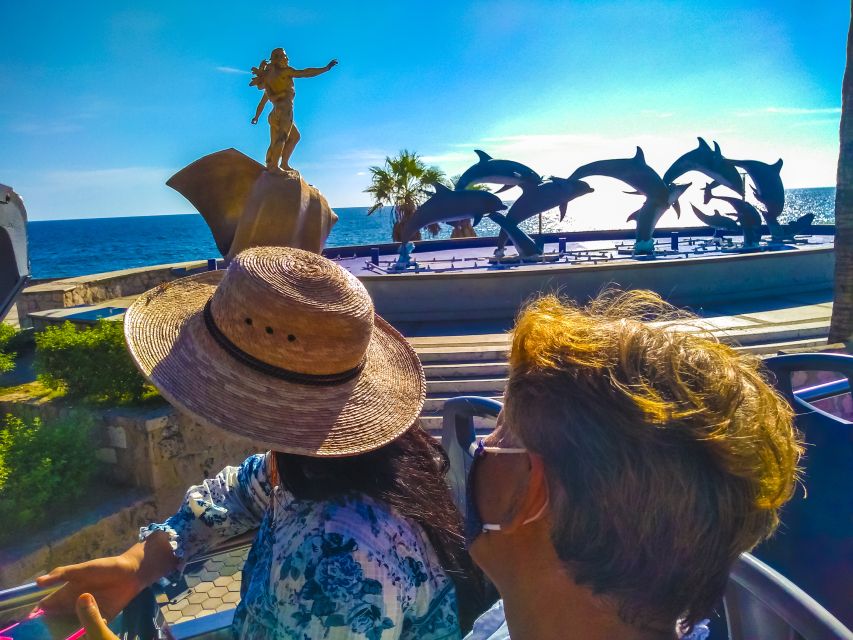 Mazatlán: Double-Decker Bus, Cliff Diving & Walking Tour - Playa Norte, bird feeding, and the quick reality check