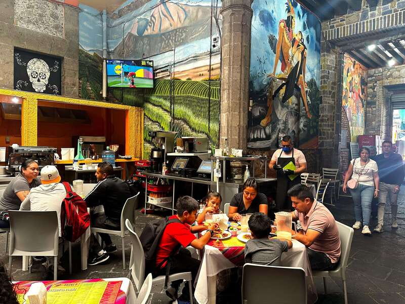 Mexico City: Old Town Food Tour of 7 Tastings & Secret Dish - Market morning style: chilaquiles and the first big payoff