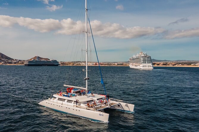 Multimillion Yacht Cabo Cruise Sunset or Snorkel Optional PICKUP! - Onboard experience: open bar, music, restrooms, and the photo deal