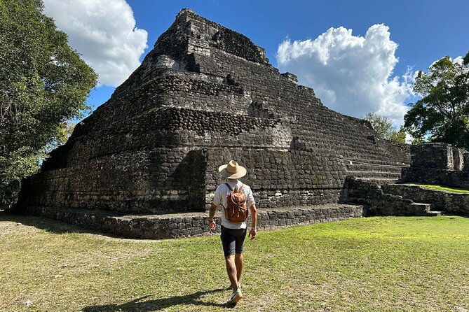 One Day Tour to Chacchoben Mayan City and Bacalar Lagoon with a Certified Guide - Getting there and back from Costa Maya: meeting point, walking time, and AC bus reality